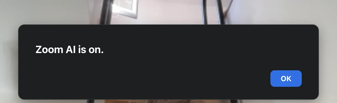 The "Zoom AI is on." notice a participant sees mid-call, with a single OK button